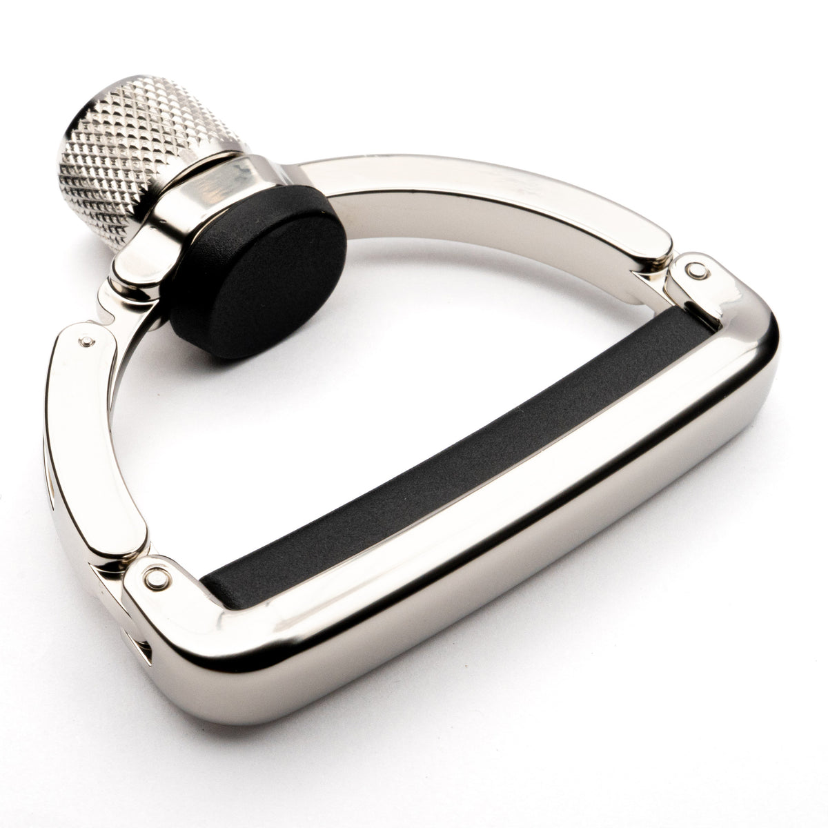 Ratchet arm, spring pad, and thumb screw on the Black Mountain Capo