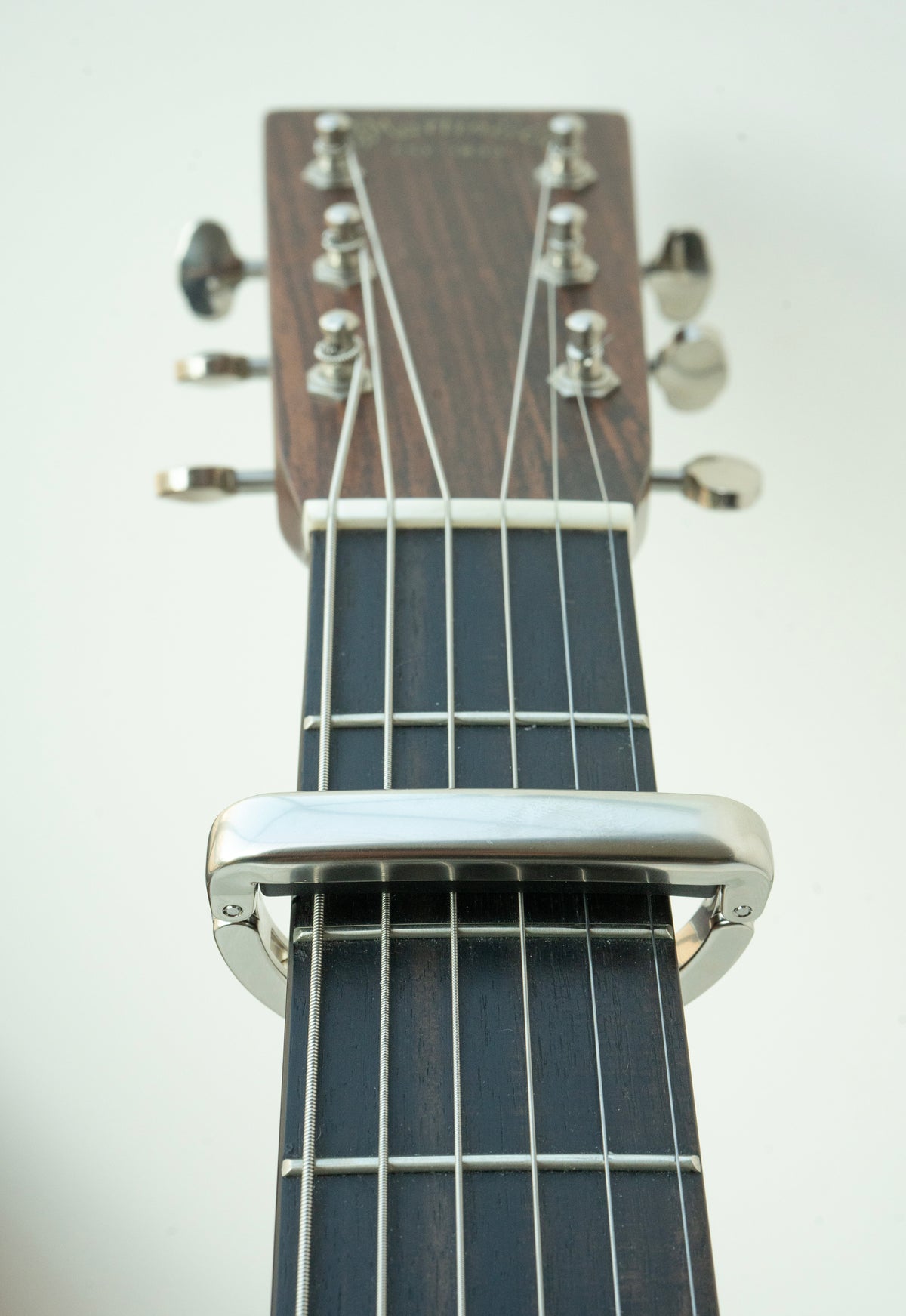 Black Mountain Capo making contact from the low E to the high E